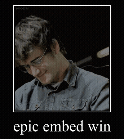 A Picture Of A Man With Glasses And The Words Epic Embed Win On The Bottom GIF