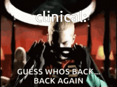 A Picture Of A Man With Horns And The Words " Clinical Guess Whos Back ... Back Again " GIF