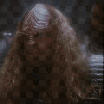 A Picture Of A Man With Long Hair And The Words " Victory Is Yours " Below Him GIF