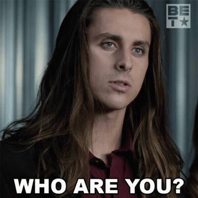 A Picture Of A Man With Long Hair Asking " Who Are You " GIF