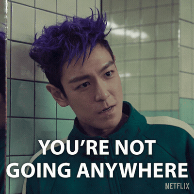 A Picture Of A Man With Purple Hair And The Words You 'Re Not Going Anywhere GIF