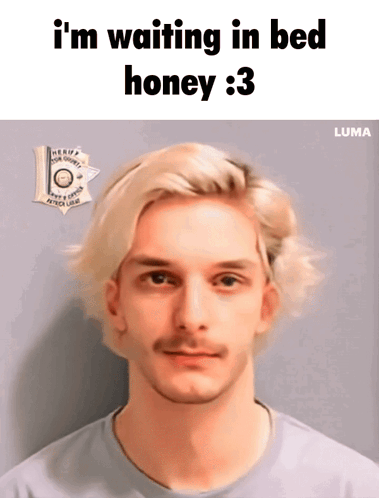 A Picture Of A Man With The Caption " I 'M Waiting In Bed Honey " GIF