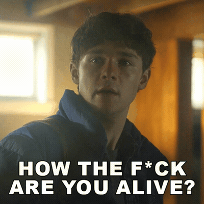 A Picture Of A Man With The Words " How The F * Ck Are You Alive " GIF
