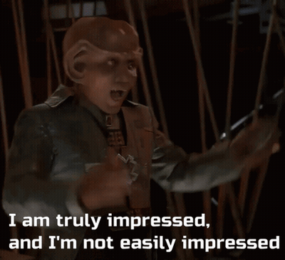 A Picture Of A Man With The Words I Am Truly Impressed And I 'M Not Easily Impressed GIF