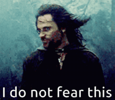A Picture Of A Man With The Words " I Do Not Fear This " Behind Him GIF