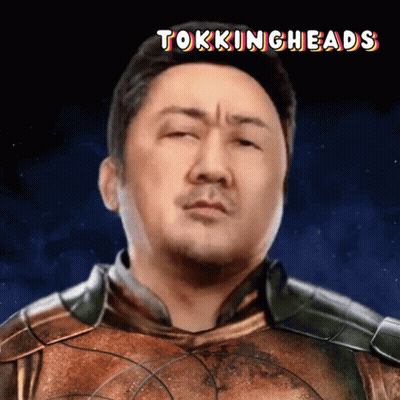 A Picture Of A Man With The Words Tokingheads Written Above Him GIF