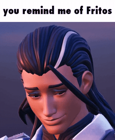 A Picture Of A Man With The Words " You Remind Me Of Fritos " On The Bottom GIF