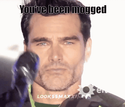 A Picture Of A Man With The Words You 'Ve Been Mogged On The Bottom GIF