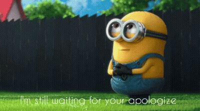 A Picture Of A Minion With The Words I 'M Still Waiting For Your Apologize GIF