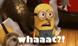 A Picture Of A Minion With The Words Whaaat Written On It GIF