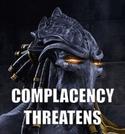 A Picture Of A Monster With The Words Complacency Threatens Below It GIF