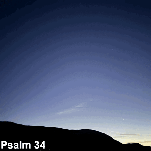 A Picture Of A Mountain With The Words Psalm 34 On The Bottom GIF