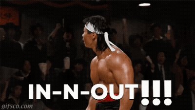 A Picture Of A Muscular Man With The Words In-N-Out Written Below Him GIF