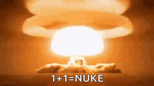 A Picture Of A Nuclear Explosion With The Words 1 + 1 = Nuke GIF