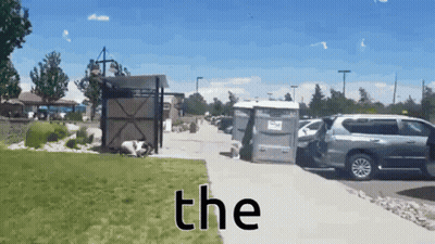 A Picture Of A Parking Lot With The Word The At The Bottom GIF