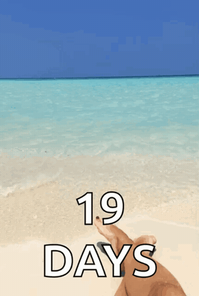 A Picture Of A Person Laying On A Beach With The Words 19 Days Below Them GIF