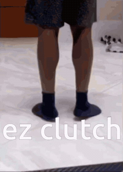 A Picture Of A Person 'S Legs With The Words Ez Clutch Below It GIF