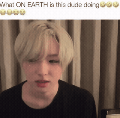 A Picture Of A Person With The Words What On Earth Is This Dude Doing GIF