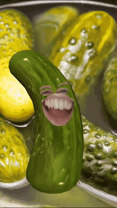 A Picture Of A Pickle With A Smiling Face GIF