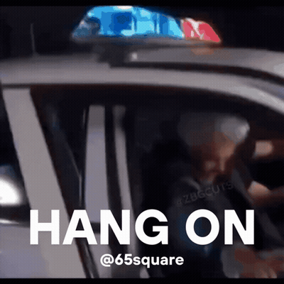 A Picture Of A Police Car With The Words Hang On On The Bottom GIF