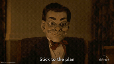 A Picture Of A Puppet With The Words Stick To The Plan On It GIF