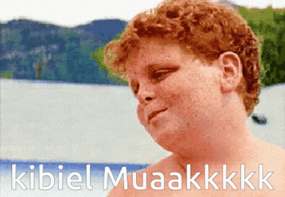 A Picture Of A Red Haired Boy With The Words Kibiel Muaakkk Written Below Him GIF