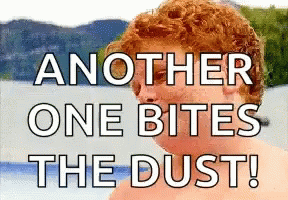 A Picture Of A Red Haired Man With The Words " Another One Bites The Dust " GIF