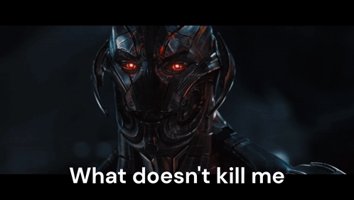 A Picture Of A Robot With The Words " What Does N't Kill Me " On The Bottom GIF