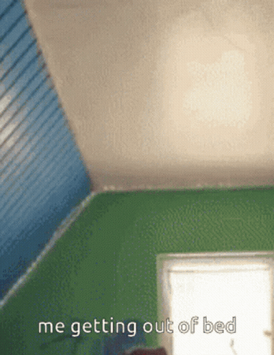 A Picture Of A Room With The Words Me Getting Out Of Bed Written On It GIF