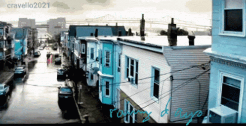 A Picture Of A Row Of Houses With The Caption Cravello2021 On The Bottom GIF