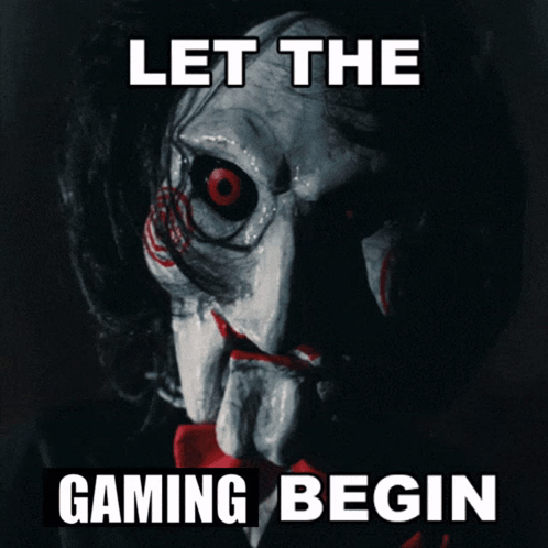 A Picture Of A Scary Puppet With The Words Let The Gaming Begin Below It GIF