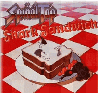 A Picture Of A Shark Sandwich On A Plate GIF