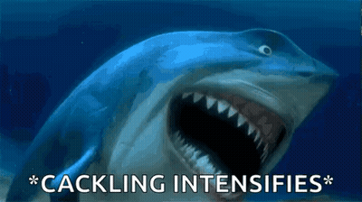A Picture Of A Shark With Its Mouth Open And The Words " Cackling Intensifies " Below It GIF