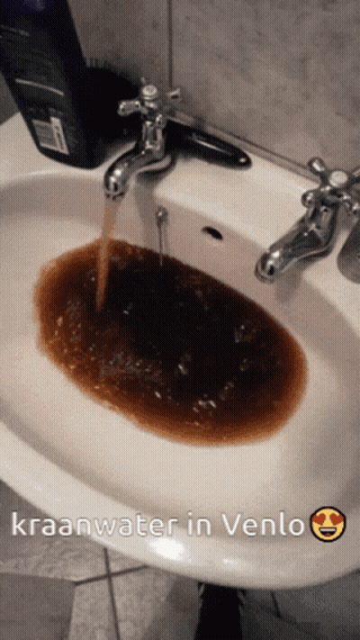 A Picture Of A Sink With Kraanwater In Venlo Written Below It GIF