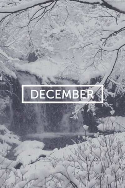 A Picture Of A Snowy Waterfall With The Month Of December GIF