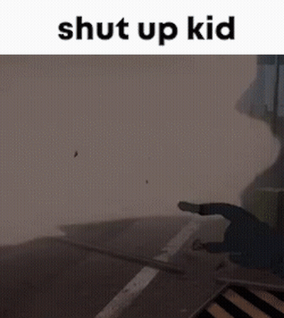 A Picture Of A Street With The Words Shut Up Kid On Top GIF