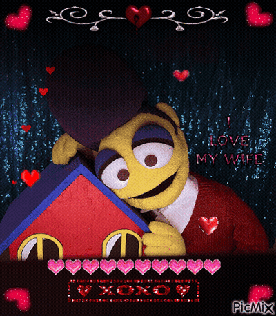 A Picture Of A Stuffed Animal With The Words Love My Wife GIF