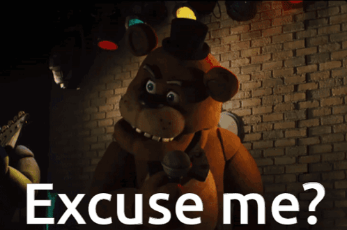 A Picture Of A Teddy Bear Holding A Microphone With The Words Excuse Me GIF