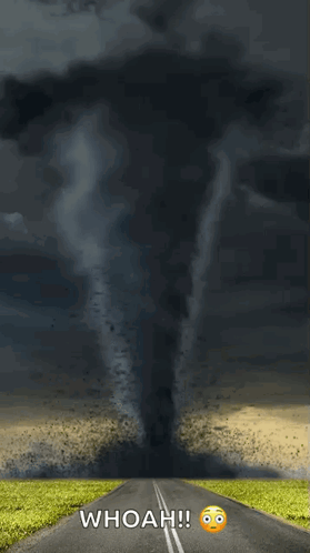 A Picture Of A Tornado Coming Down A Road With The Caption Whoah GIF