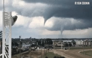 A Picture Of A Tornado With The Name Ryan Dunn On The Bottom GIF