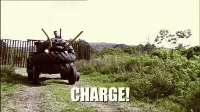 A Picture Of A Tractor With The Word Charge Written On It GIF