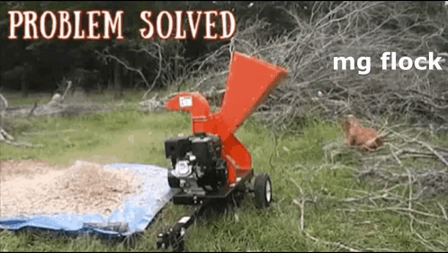 A Picture Of A Tree Chipper With The Words Problem Solved Mg Flock On It GIF