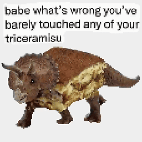 A Picture Of A Triceratops With A Tiramisu Crust On Its Back GIF