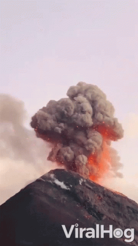 A Picture Of A Volcano Erupting With The Words Viralhog Written Below It GIF