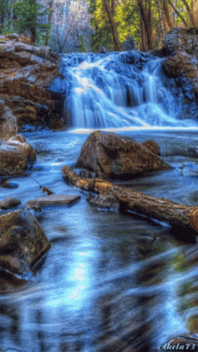 A Picture Of A Waterfall With The Number 73 On The Bottom GIF