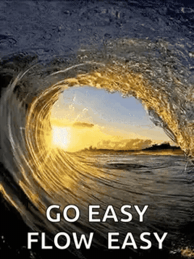 A Picture Of A Wave In The Ocean With The Words `` Go Easy Flow Easy '' GIF