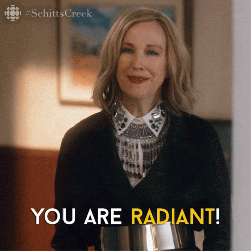 A Picture Of A Woman From Schitt 'S Creek With The Caption You Are Radiant GIF