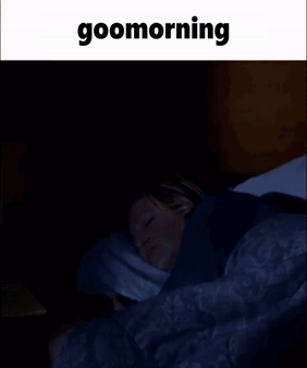 Woman Lying In Bed With Goomorning Text GIF