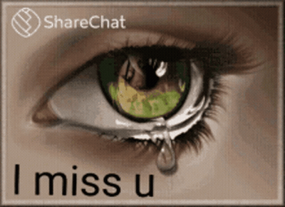 A Picture Of A Woman 'S Eye With A Tear Coming Out Of It GIF