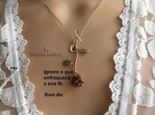 A Picture Of A Woman Wearing A Necklace With A Rose On It GIF